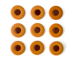 Sax Pad: Tan Leather. Plastic Disc 24.5mm