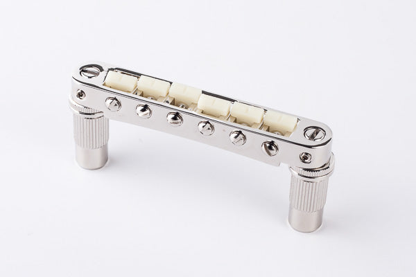 TonePros Bridge Metric Thread Ivory Nylon, pre-notched, Nickel